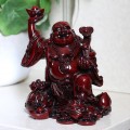 Budda ze sztabką złota (toelem) i workiem pieniędzy - figurka wys. 16,5 cm - radość życia, jasność umysłu, bogactwo