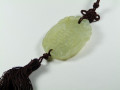 Amulet z jadeitu z chińskim znakiem 